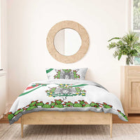 White duvet bedding set with green cactus and lemon design on wooden bed; two pillows