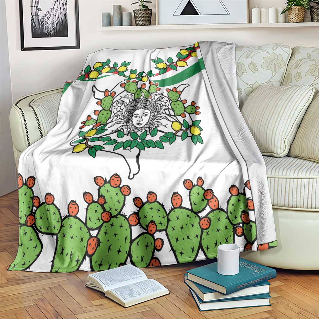 White blanket with green cactus and orange-and-green cactus pattern, with lemon accents and motif.