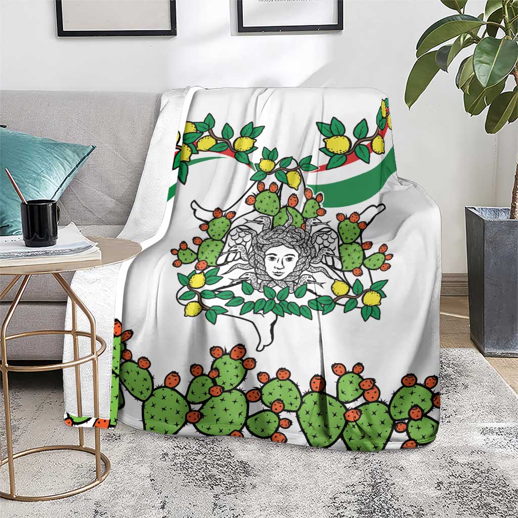 White blanket draped on chair with cactus, lemons, and central woman face illustration.