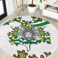 White round carpet with centered triskelion face, cactus and lemon accents