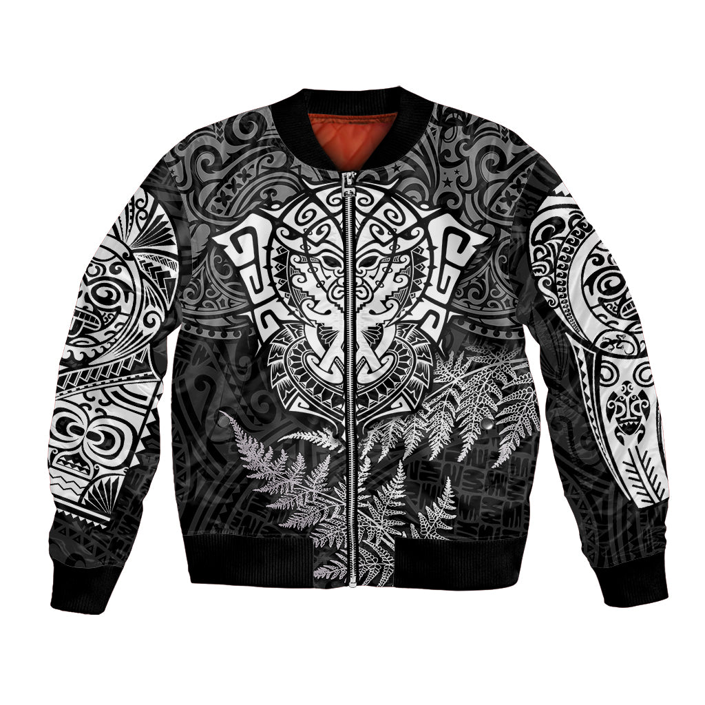 Black bomber jacket with white Maori-style tattoo graphics, full front zipper, ribbed hem
