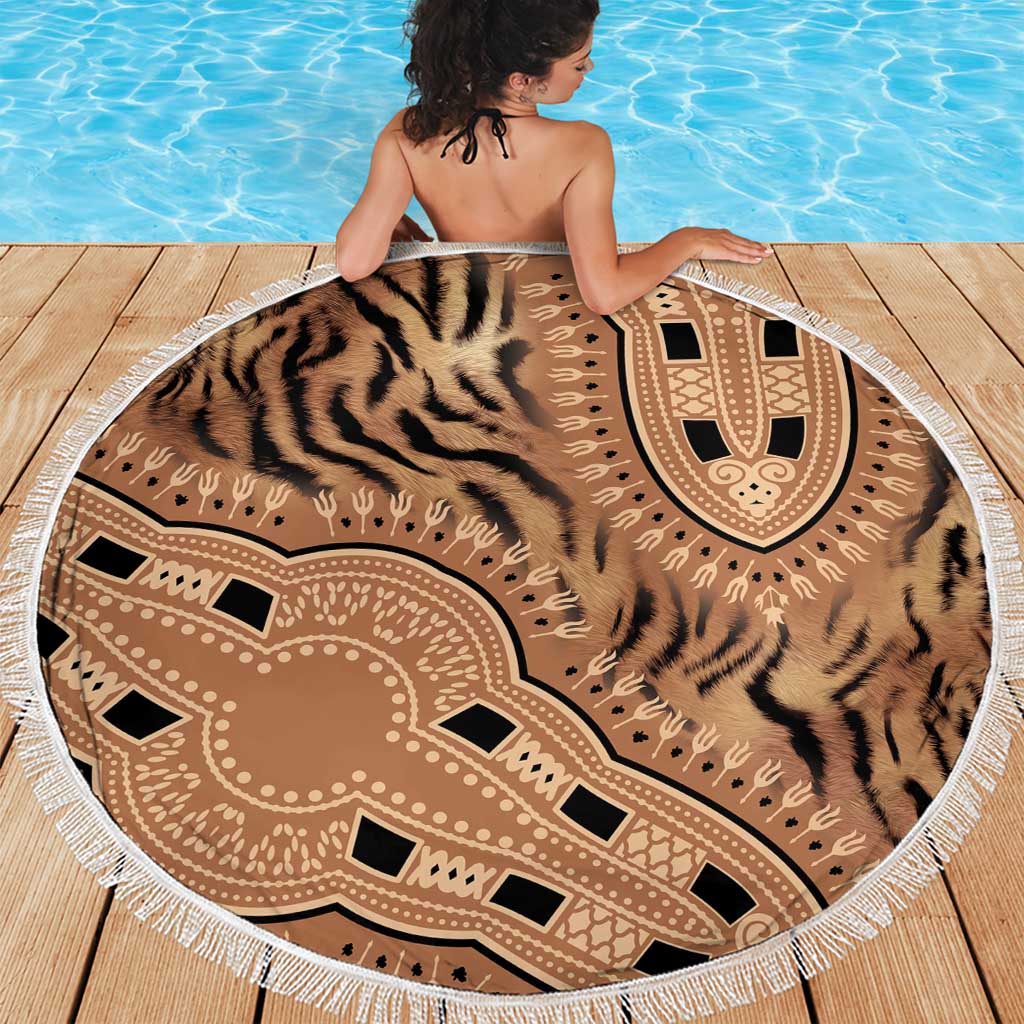 Round beach blanket with tiger-stripe pattern and tribal medallion, white tassel fringe