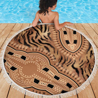 Round beach blanket with tiger-stripe pattern and tribal medallion, white tassel fringe
