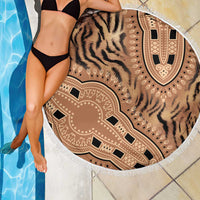 Round beach blanket with tiger-stripe and tribal motifs, white fringed border