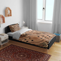 Tribal tiger-print bedding set on modern bed with two matching shams and duvet