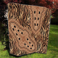 Beige zebra stripe quilt with two decorative ornamental panels
