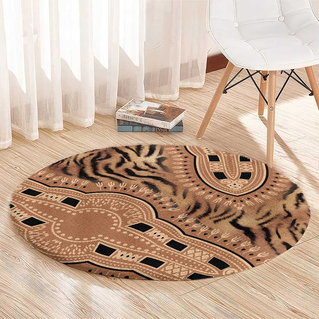 Round tiger-stripe tribal carpet rug in corner view, beige with dark accents