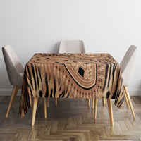 Beige and black tribal tiger print tablecloth on rectangular dining table