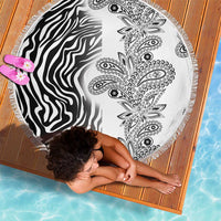 Round beach blanket with zebra stripes and paisley motif, white and black, fringed edge