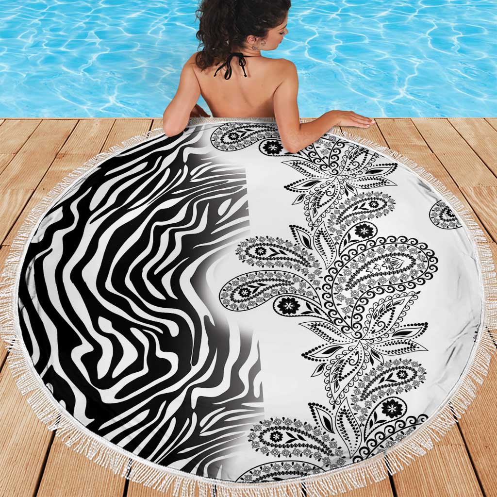 Fringed round beach blanket featuring zebra stripes and black paisley on white