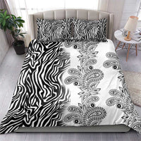 Black and white bedding set with zebra stripe panel and paisley floral center design