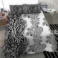 Black and white duvet bedding set featuring zebra stripes and large paisley floral motif