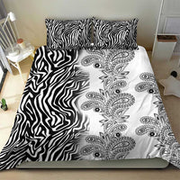 Black and white bedding set with zebra stripe background and ornate paisley floral medallions