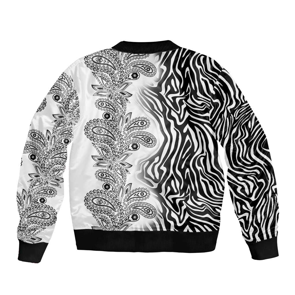 Unisex bomber jacket, white front with paisley print and black zebra stripe panel, ribbed hem