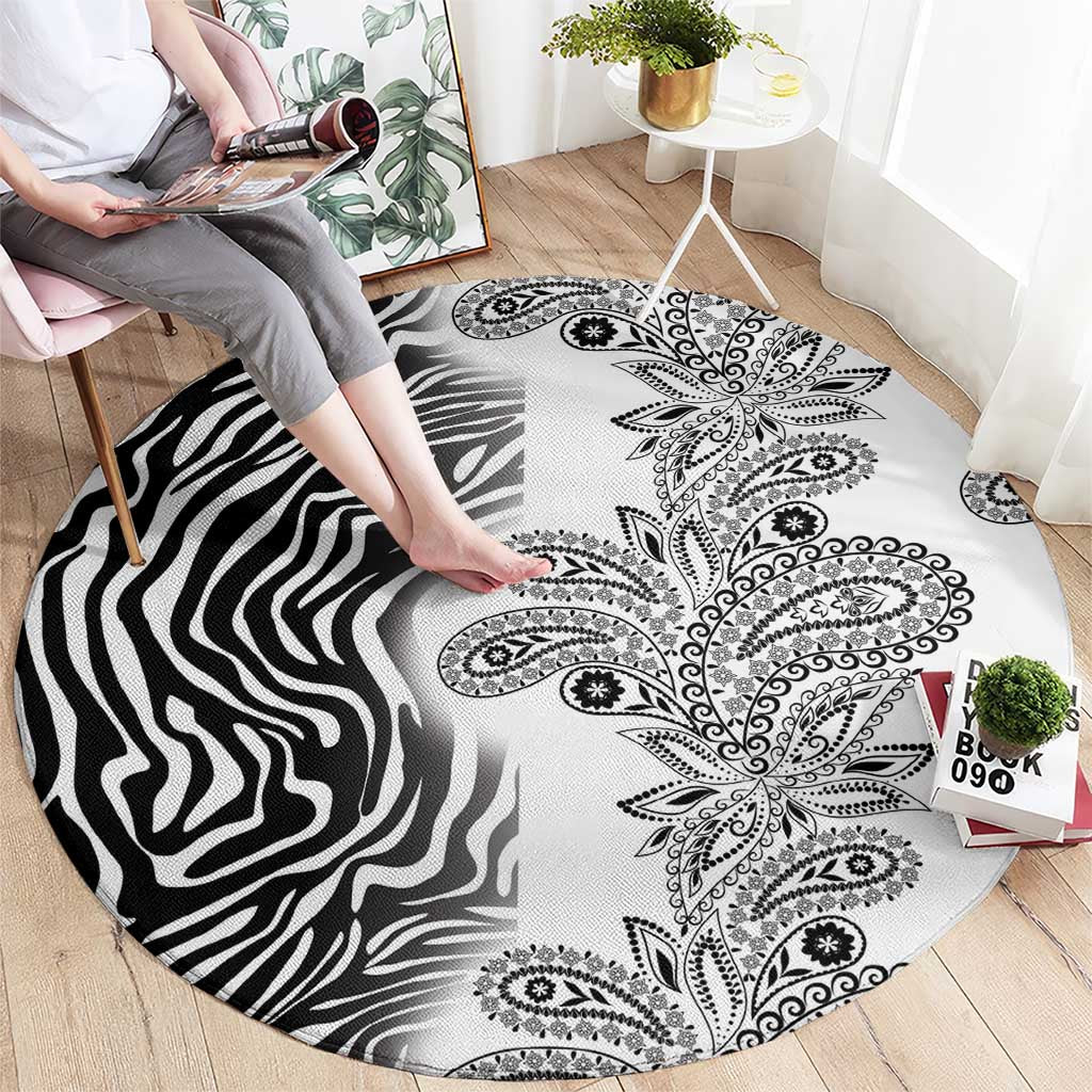 Round carpet with zebra stripe texture and detailed paisley medallion pattern