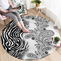 Round carpet with zebra stripe texture and detailed paisley medallion pattern
