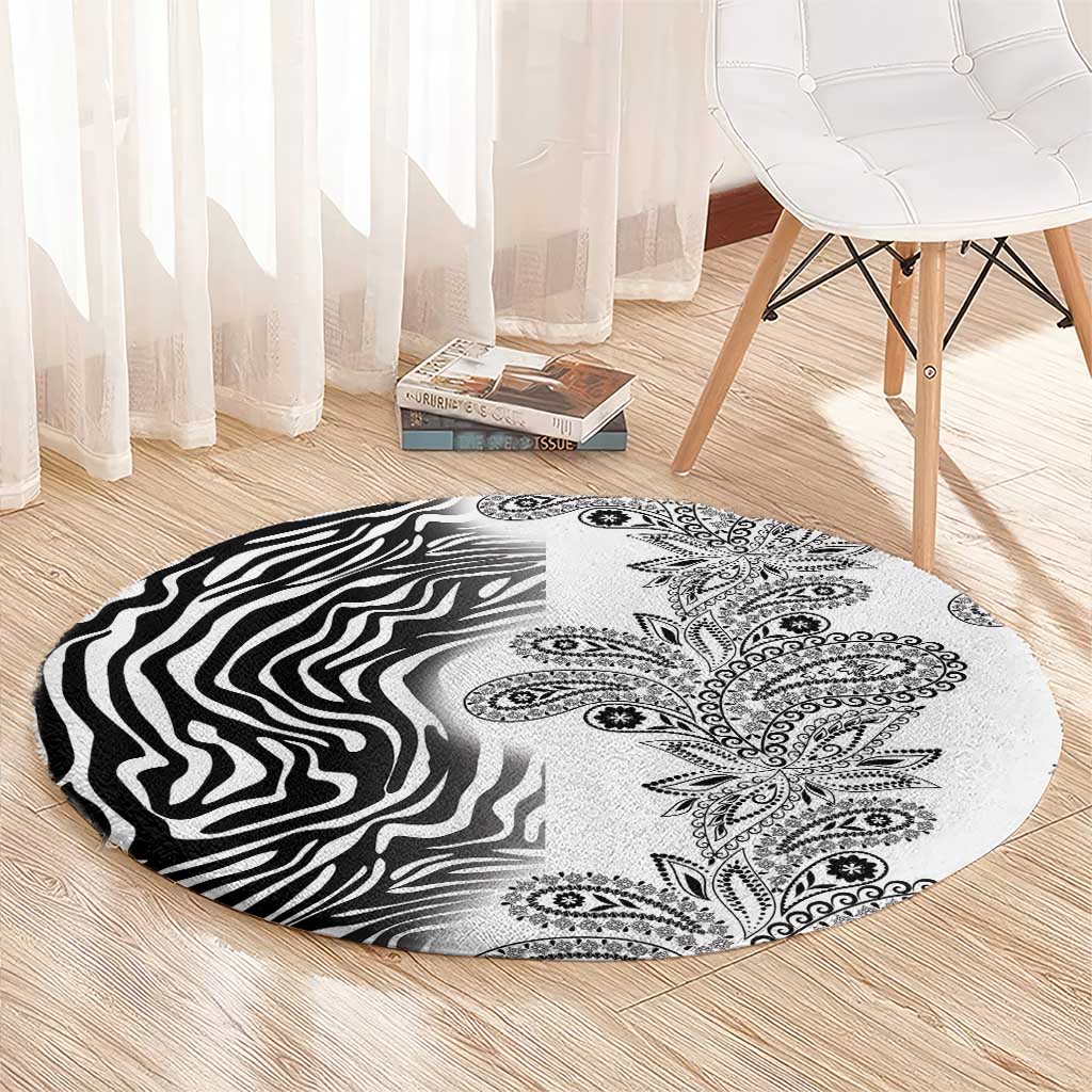 Round zebra and paisley tribal patterned carpet in black, white and gray
