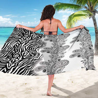Black and white zebra paisley sarong with tribal medallion print, draped