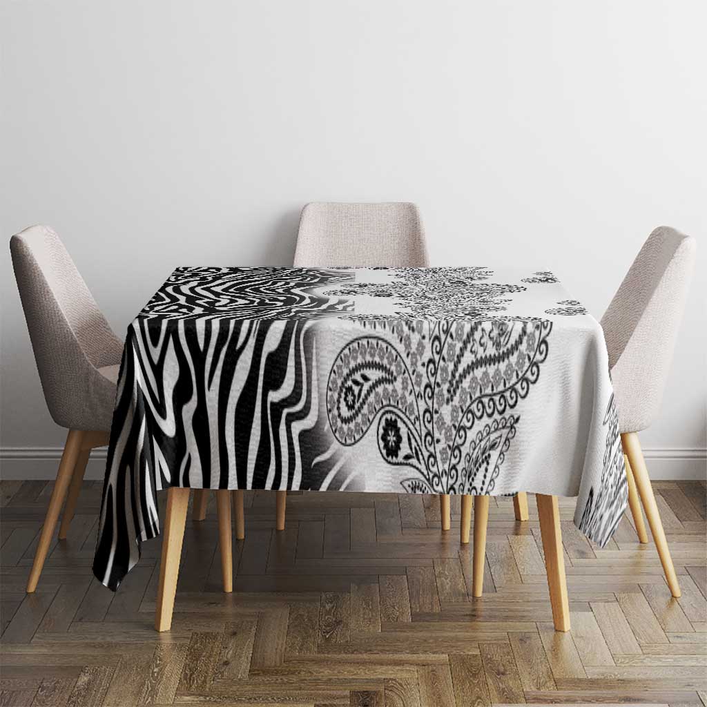 White tablecloth with black zebra stripes and paisley tribal motifs, rectangular drape