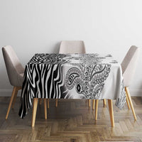 White tablecloth with black zebra stripes and paisley tribal motifs, rectangular drape