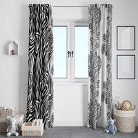 Zebra stripe and paisley window curtain panels in black and white, vertical hanging folds