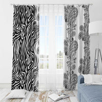 Two sheer-look window curtain panels with zebra stripes and paisley pattern in black/white