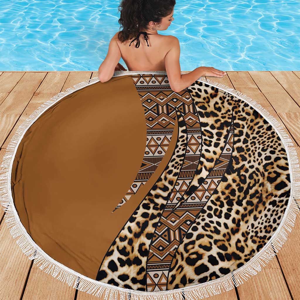 Round beach blanket with leopard print and tribal pattern, fringed edge, brown base