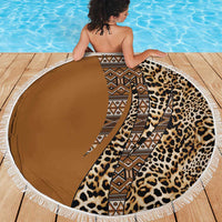 Round beach blanket with leopard print and tribal pattern, fringed edge, brown base