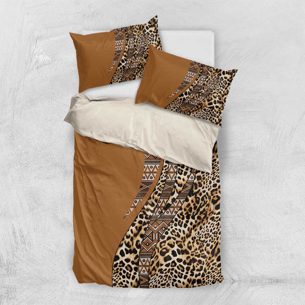 Gold and brown bedding set with leopard print and tribal patterned panels, plus pillowcases