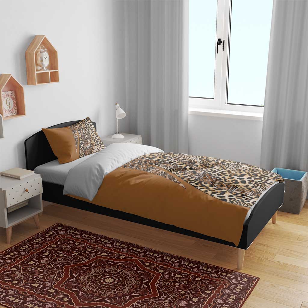 Gold and brown bedding set with leopard print and tribal patterns on duvet cover with two pillowcases