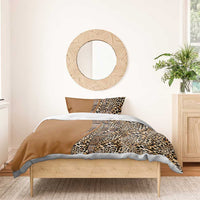 Gold and brown bedding set featuring leopard print with tribal diamond accents and two pillowcases