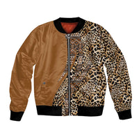 Gold bomber jacket with leopard print front panels and tribal stripe design, ribbed cuffs.