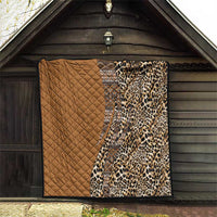 Quilt hung on exterior wall: tan quilted panel, leopard-print panel, and tribal stripe