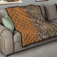 Quilt on gray sofa: tan diamond-quilted section and leopard-print section with tribal stripe