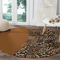 Round leopard and tribal patterned carpet with brown base and tan geometric border