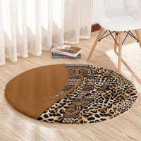 Round leopard and tribal patterned carpet with brown ground, tan spots, and zigzag band