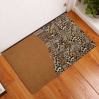 Rubber doormat featuring leopard print and tribal pattern panel on brown base