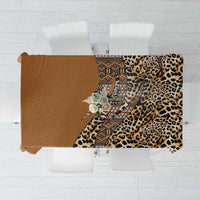 Folded gold leopard tablecloth with native tribal pattern insert