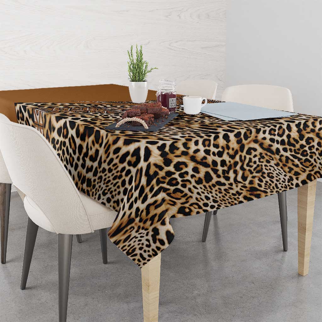Leopard print tablecloth with native tribal border, gold and dark tan tones