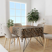 Leopard print tablecloth with native pattern edge on dining table