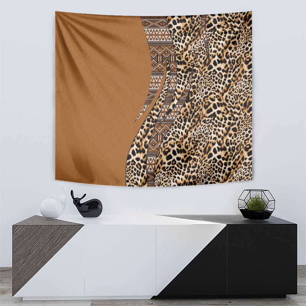 Gold and brown tapestry featuring leopard spots and patterned tribal panel