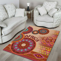 Beige tribal area rug with circular medallion and multicolor geometric motifs