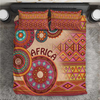 Beige African tribal bedding set featuring duvet and two pillow shams with circular medallions