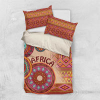 Beige tribal bed cover set with colorful circular motifs and two matching pillow shams