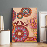 Upright framed beige canvas wall art with 'AFRICA' text, circular mandala motif, and shapes.