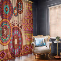 Beige tribal window curtain pair with arched circle motifs and geometric stripes