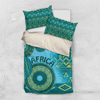 Turquoise tribal bedding set with two pillows and matching duvet, geometric and circular pattern