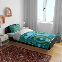 Blue teal tribal bedding set with circular motifs and two coordinating pillows