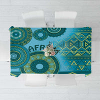 Blue tribal pattern tablecloth with teal geometric motifs and fringe edge