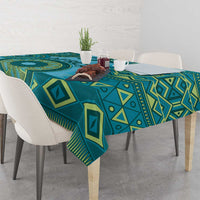 Teal and blue tribal geometric tablecloth with diamond shapes and fringe